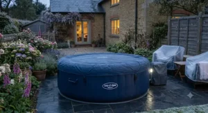 Insulated thermal cover secured over a 4 person inflatable hot tub to retain heat during British winters.