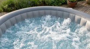 Close-up of massaging bubble jets active inside a family size inflatable hot tub
