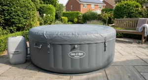 Insulated inflatable cover fitted securely onto a Lay-Z-Spa hot tub to conserve heat